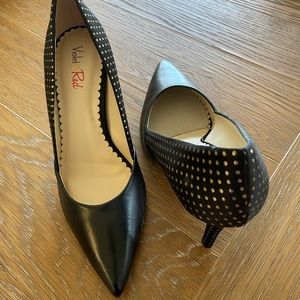 Black pumps with gold embellishment. Never worn.